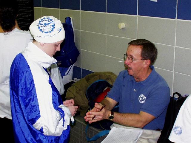Rick Curl talks to swimmer